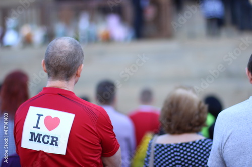 I love Manchester shirt on back of person in crowd