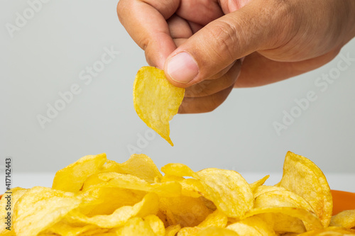 Crispy potato chips. Snacks Fast food or junk food snacks unhealthy concept. photo