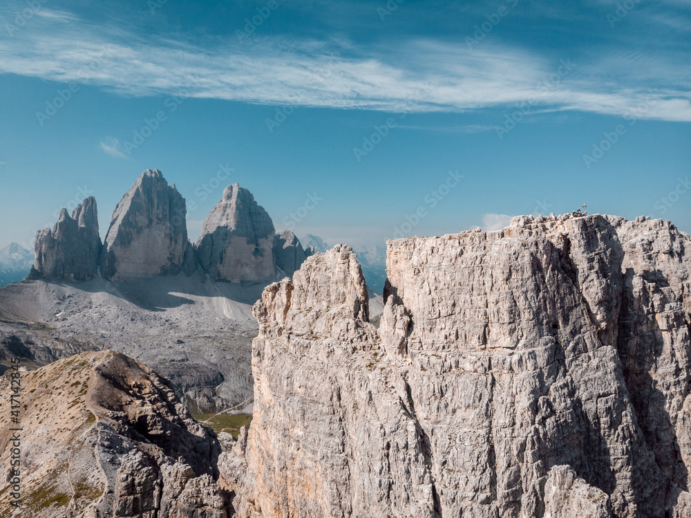 Fototapeta premium The Torre di Toblin (Toblinger Knoten) in front of the Tre Cime di Lavaredo (Drei Zinnen), South Tyrol, Italy