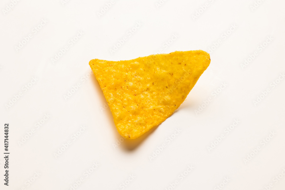 Crispy mexican nachos chips salty.Snacks Fast food or junk food snacks unhealthy concept. Crispy mexican nachos chips salty.Snacks Fast food or junk food snacks unhealthy concept.