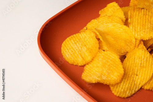 Crispy potato chips. Snacks Fast food or junk food snacks unhealthy concept. photo