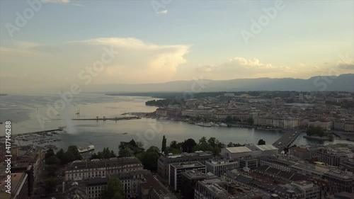 sunset time geneva cityscape lakeside fountain bay aerial panorama 4k switzerland