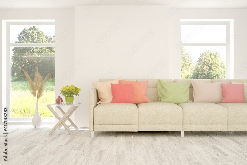 Fototapeta premium Minimalist living room in white color with sofa and summer landscape in window. Scandinavian interior design. 3D illustration