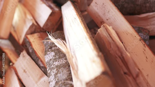 Holz Scheiter als Brennstoff für den Kamin in 4k 10 Bit photo