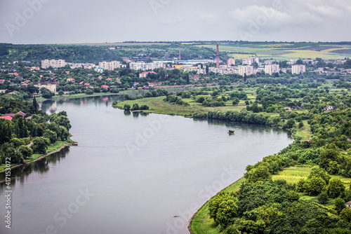 Aerial view of Dniester River between Moldova, Soroca city on left, Tsekynivka village on right photo