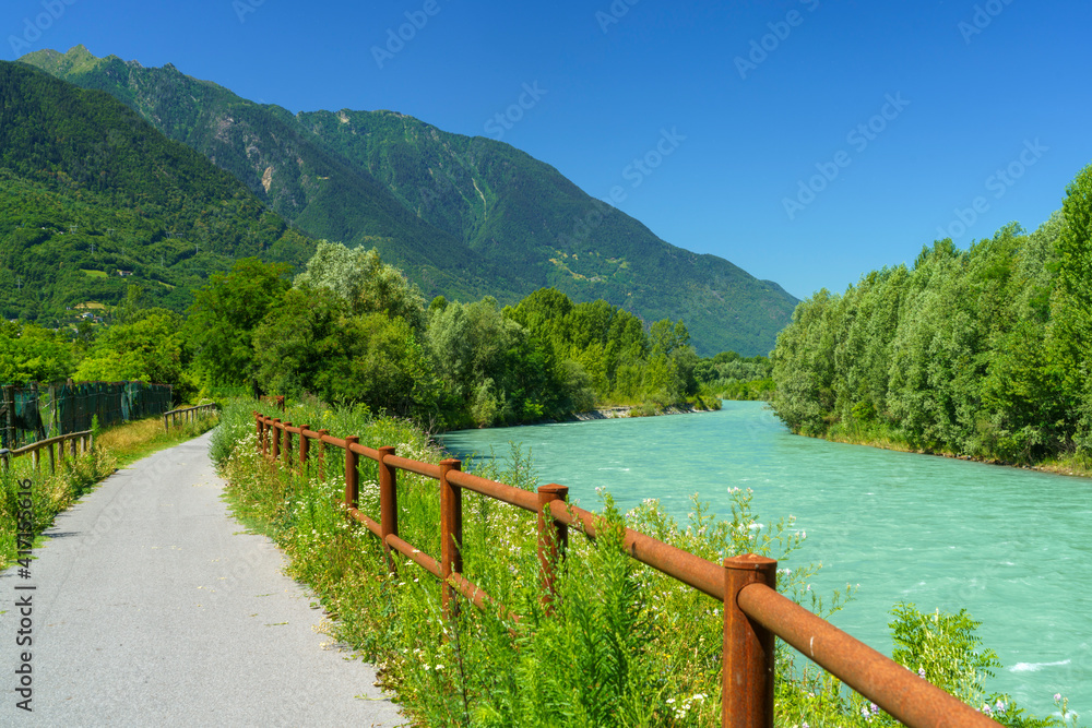The Adda river along the Sentiero della Valtellina at summer