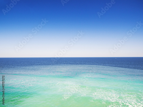 Aqua Atlantic ocean during the late afternoon at Central Florida USA © Photoman