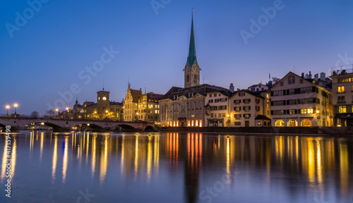 View of skyline of the swiss city Zurich reflecting on the Limmat river