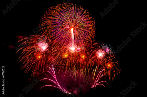 celebration happy new year and merry christmas firework isolated on black isolated background