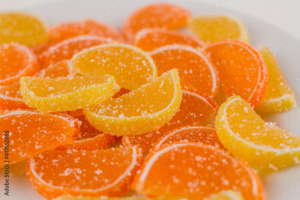 marmalade in the form of slices of orange and lemon in sugar marmalade in the form of slices of orange and lemon in sugar