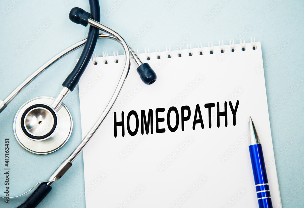 the text HOMEOPATHY is In the notebook, stethoscope. healthcare. medical concept the text HOMEOPATHY is In the notebook, stethoscope. healthcare. medical concept