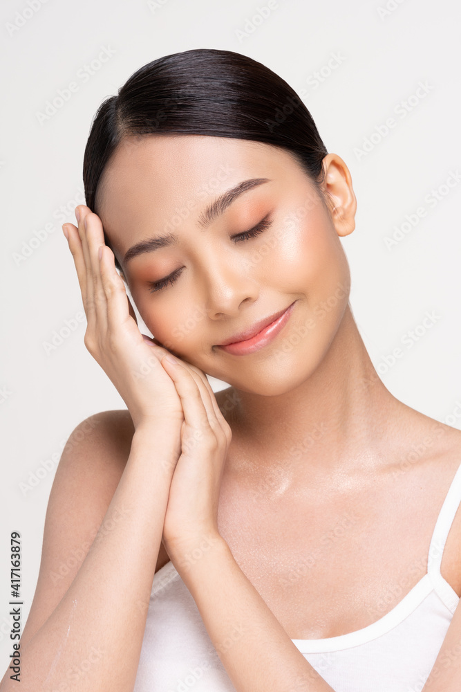 Beautiful Asian young woman touching soft cheek smile with clean and fresh skin Happiness and cheerful with positive emotional,isolated on white background,Beauty and Cosmetics Concept Beautiful Asian young woman touching soft cheek smile with clean and fresh skin Happiness and cheerful with positive emotional,isolated on white background,Beauty and Cosmetics Concept