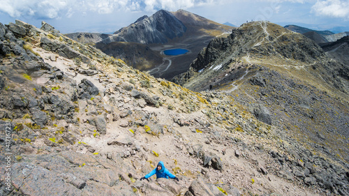 Hiker is climbling onto the summit of Nevado de Toluca, Mexico photo