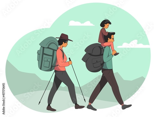 A young family goes on a hike. Mom and dad with a child go with backpacks against the backdrop of mountains.