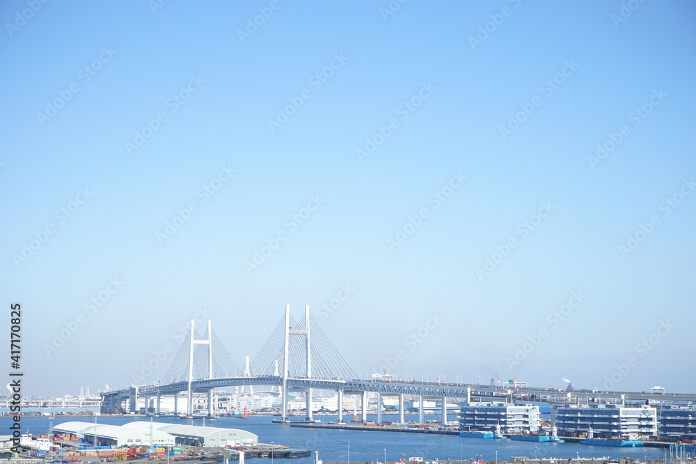 Yokohama City landscape from Observatory of Harbor Viewing Park in Yokohama, Japan. Bay bridge and Yamashita Pier - 港の見える丘公園からの眺望 ベイブリッジ 山下ふ頭 横浜 日本