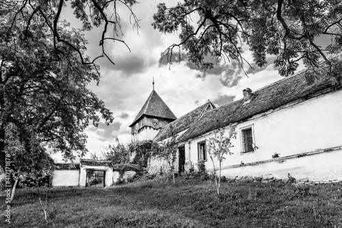 The medieval evangelical saxon fortified church of Rodbav village, near Fagaras, Brasov county, Transylvania, Romania; Traditional saxon fortified church of Transylvania photo