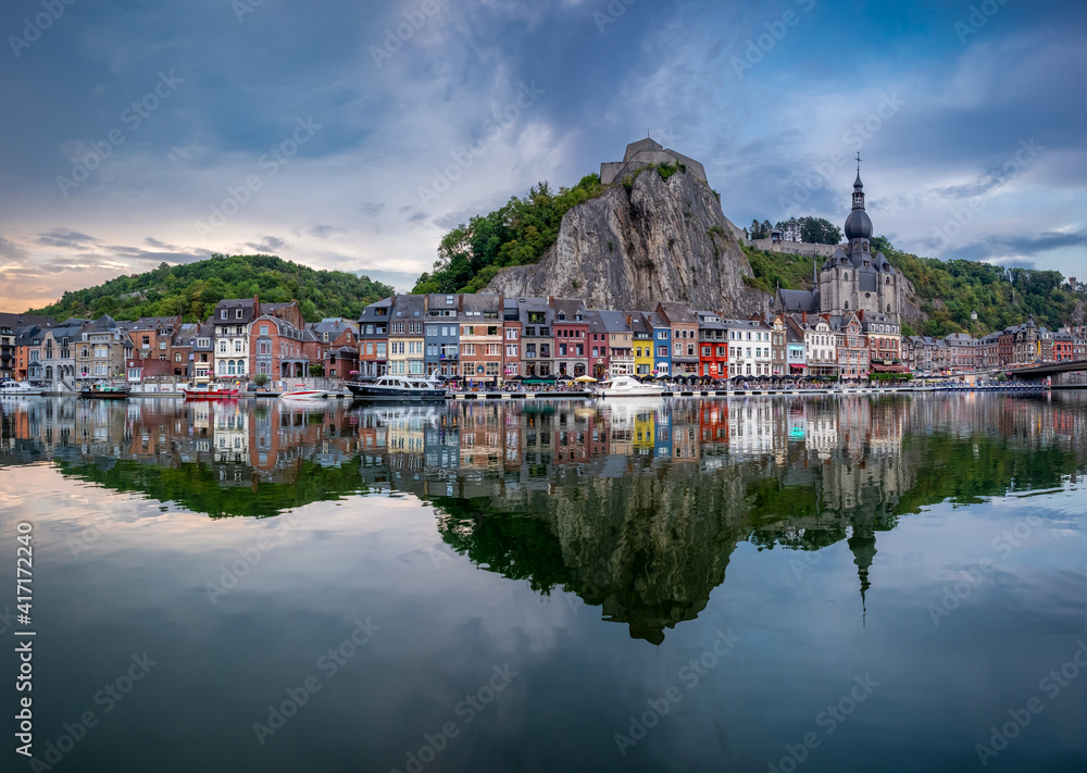 Scenic view of the Belgian town Dinant reflected in the river Meuse