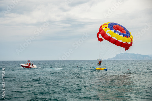 Colorful hot air balloon over the sea