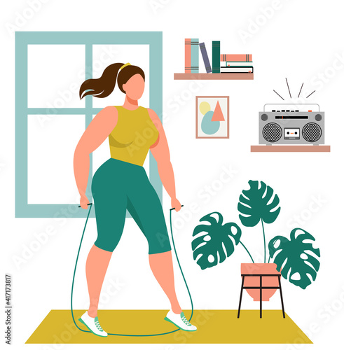 Girl who does gymnastics at home. Exercises at home quarantine sports. Healthy lifestyle