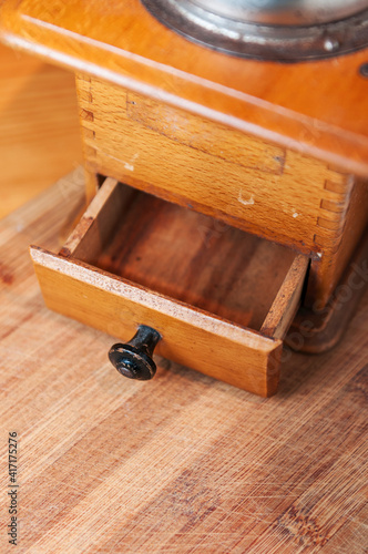 Coffee grinder with open drawer