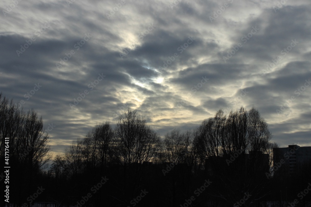 Sun behind dark clouds. Russia. Sun behind dark clouds. Russia.