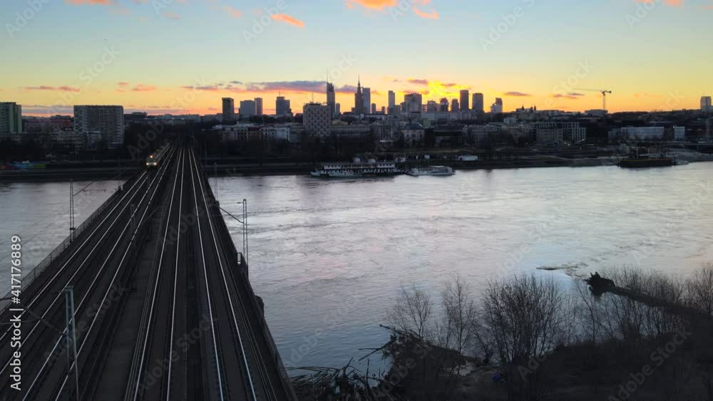 Panoramic drone view over transportation bridge in Warsaw during sunset in winter time Panoramic drone view over transportation bridge in Warsaw during sunset in winter time
