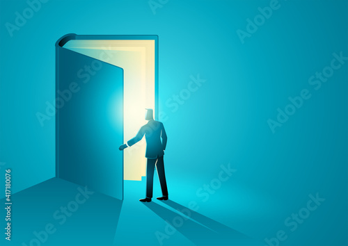 Man opening a giant book