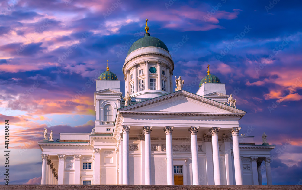Helsinki. Finland. White Cathedral against the gray clouds. Suurkirkko. Cathedral Of St. Nicholas. Cathedrals Of Finland. Architecture of the capital of Finland. A journey through the Scandinavia.