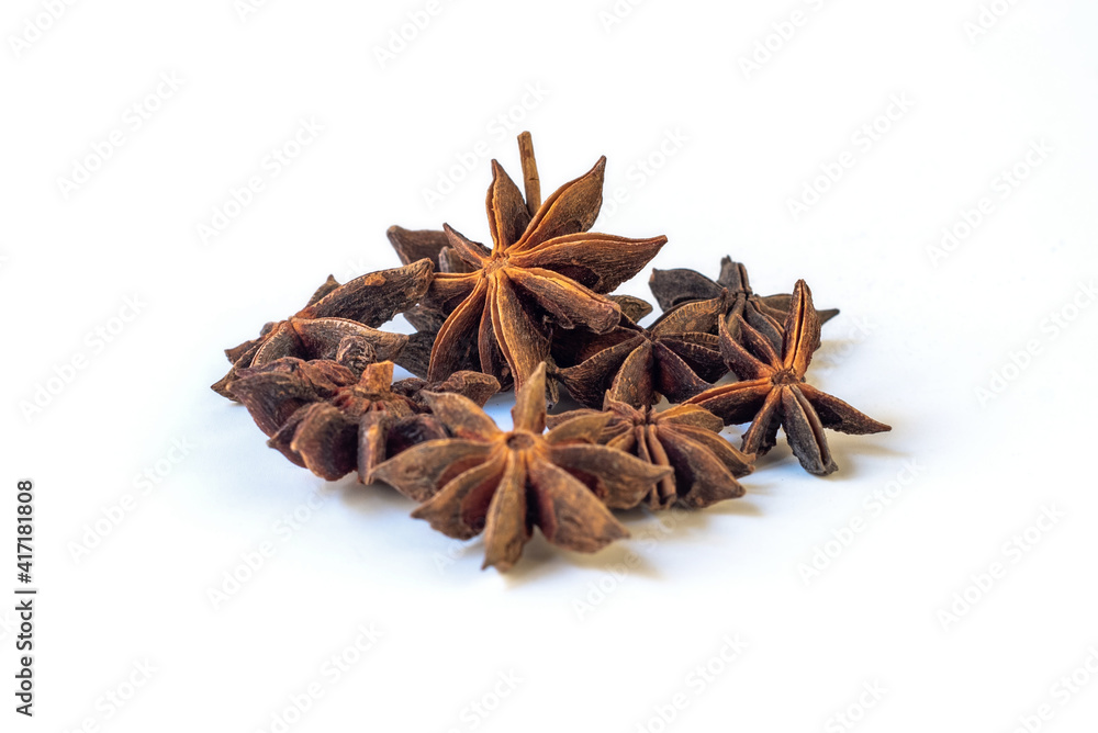 Aniseed isolated on white background, Star anise spice seeds pile Aniseed isolated on white background, Star anise spice seeds pile