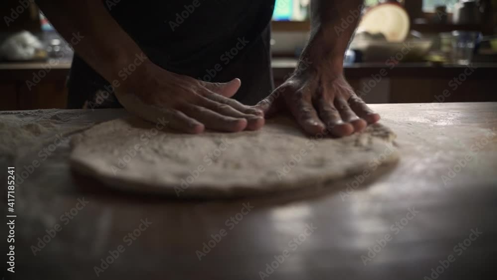 Male chef kneading homemade pizza dough on wooden table 1 Slow Motion 60FPS Male chef kneading homemade pizza dough on wooden table 1 Slow Motion 60FPS
