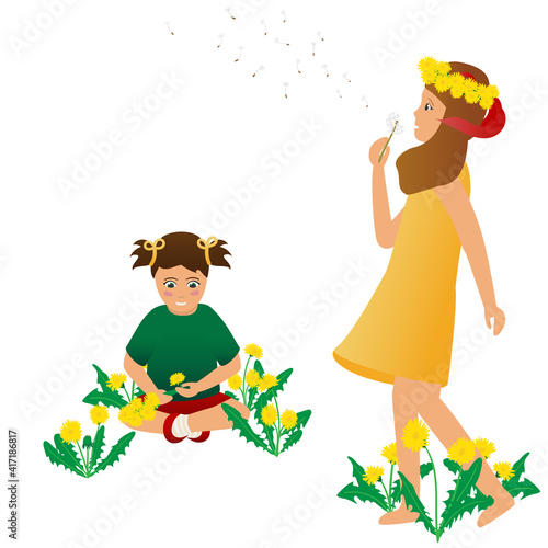 Two girls making flower crowns. One of them blows the seeds off a dandelion.