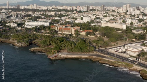 Wallpaper Mural aerial cinematic footage of santo domingo with skyline building urban cityscape and coastline ocean view. city lockdown during virus global pandemic Torontodigital.ca