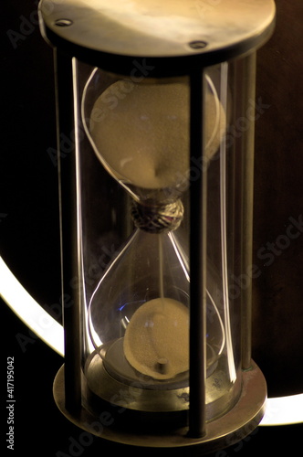 hourglass on black