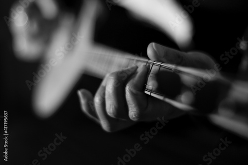 woman's hand playing the traditional turkish instrument 