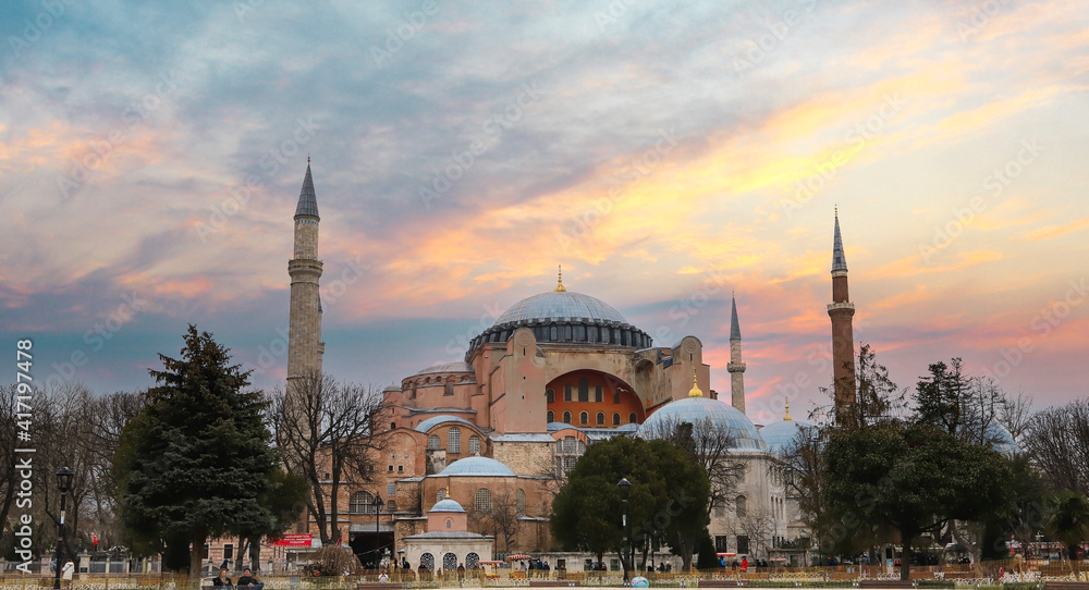 Fototapeta premium Istanbul - Turkey 25. February .2021 Byzantine emperor Justinian. After the conquest of Istanbul in 1453, it was converted into a mosque by Fatih Sultan Mehmet. Hagia Sophia mosque at sunset.