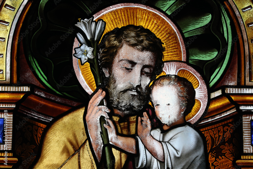 Notre-Dame Saint-Lazare collegiate church.  Stained glass window.  Saint Joseph with the infant Jesus.  Avallon. France.  22.03.2018
