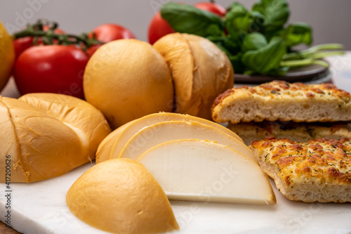 Cheese collection, Italian yellow smoked caciocavallo or scamorza cheese