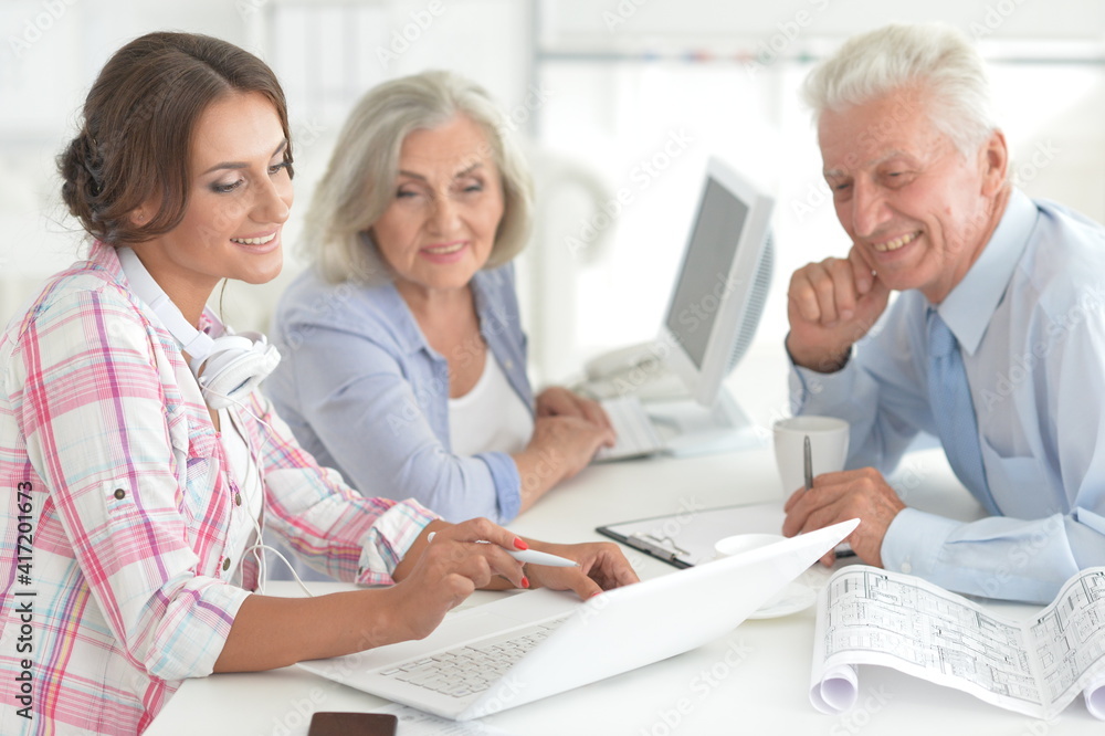 Portrait of businesspeople working in modern light office Portrait of businesspeople working in modern light office