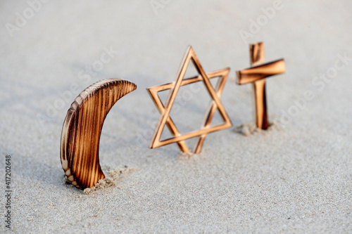 Christianity, Islam, Judaism  3  monotheistic religions. Jewish  Star, Cross and Crescent :  Interreligious symbols. 25.02.2017 photo