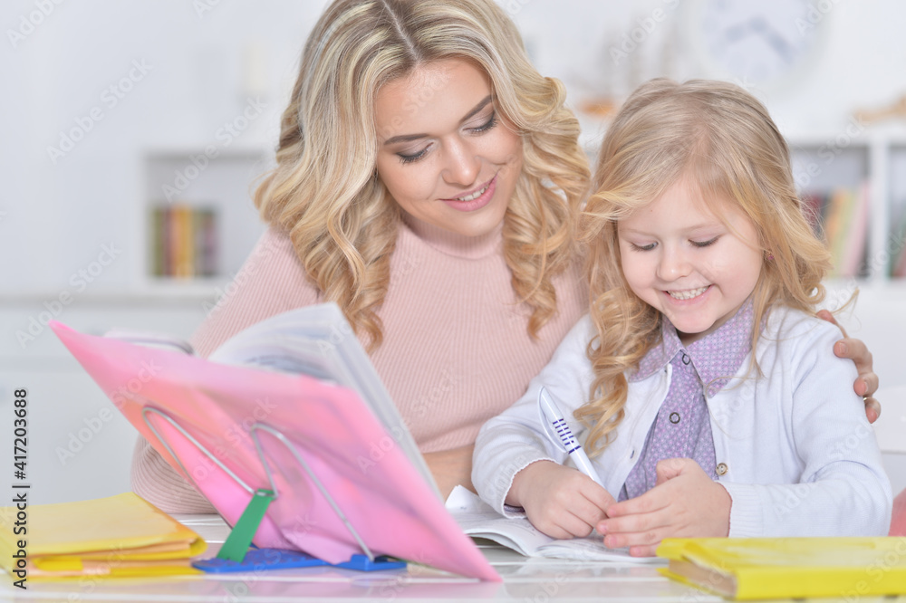 Portrait of a beautiful little cute girl with mother Portrait of a beautiful little cute girl with mother