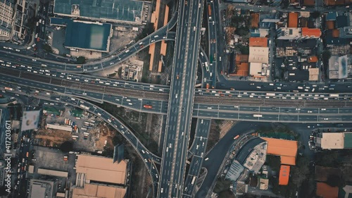 Top down aerial of cars drive at cross road. Nobody cityscape. Traffic highway transportation. Skyscrapers buildings at downtown streets. Business center of New York City, USA, North America