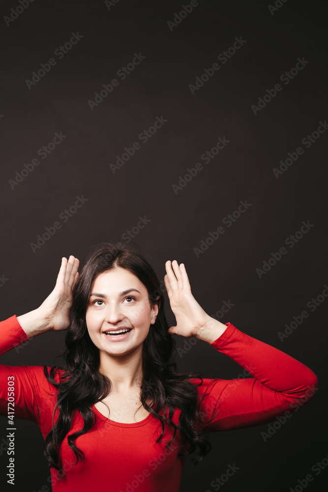 Young beautiful joyful woman celebrating making winner gesture. Celebration, winning, yes. Success concept Young beautiful joyful woman celebrating making winner gesture. Celebration, winning, yes. Success concept