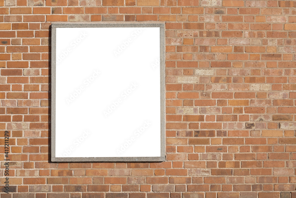Brick wall with window, white frame with space for text, stonewall with bricks, white window and street