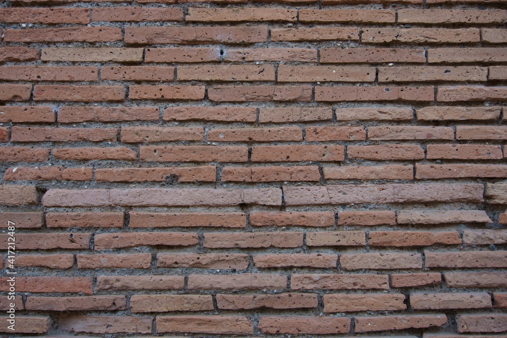 Fototapeta premium Wall constructed with roman bricks 