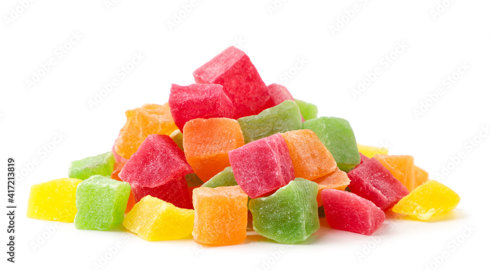Heap of candied fruit pieces on a white background. Isolated Heap of candied fruit pieces on a white background. Isolated