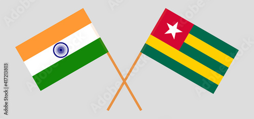 Crossed flags of India and Togo. Official colors. Correct proportion