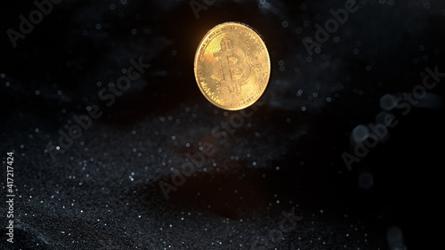 Bitcoin mining concept. A gold coin rises and shines from under the thickness of black sand. High depth of field 3d rendering