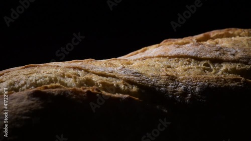 Crusty bread with an intimate light, rotation photo