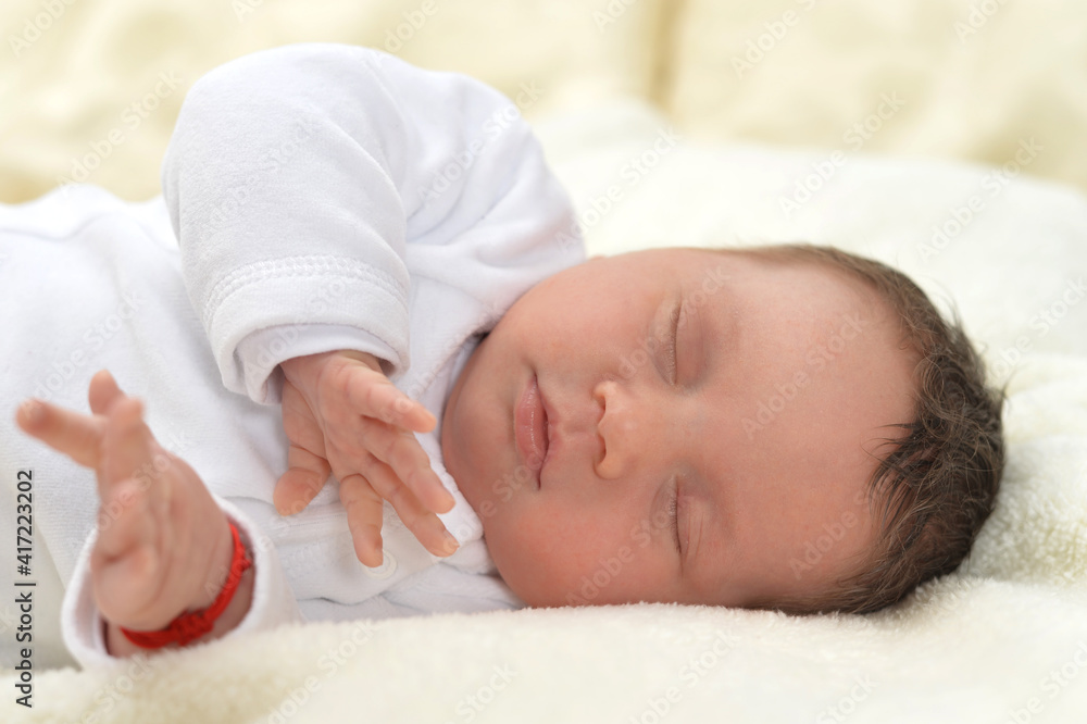 cute little baby boy on bed sleeping cute little baby boy on bed sleeping