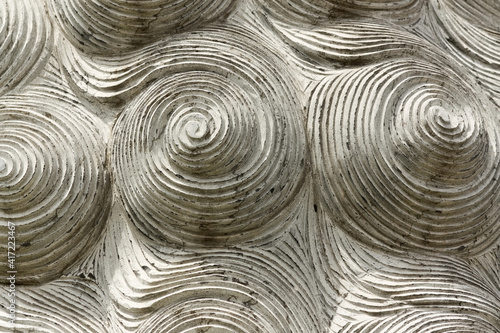 Abstract circle spirals stone background